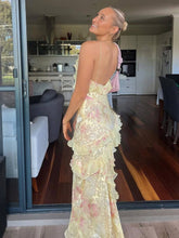 Fiorella – Floral Ruffle Backless Maxi Dress